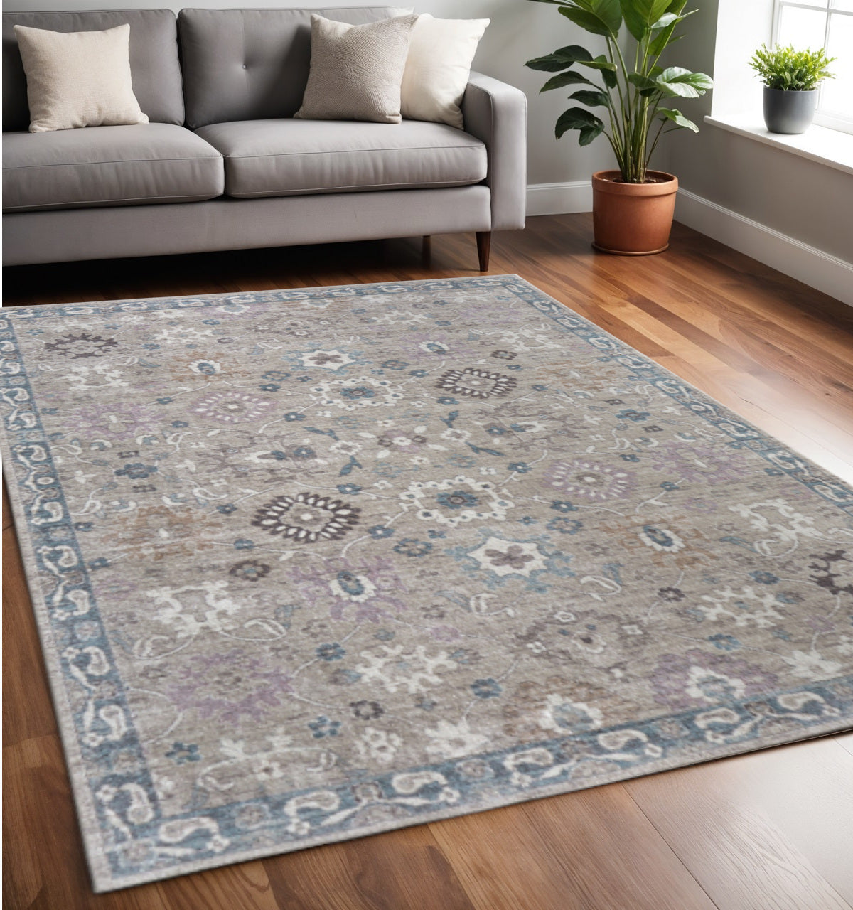 5' X 8' Gray Blue And Taupe Floral Distressed Area Rug