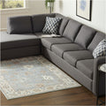9' X 12' Blue Ivory And Brown Floral Distressed Area Rug