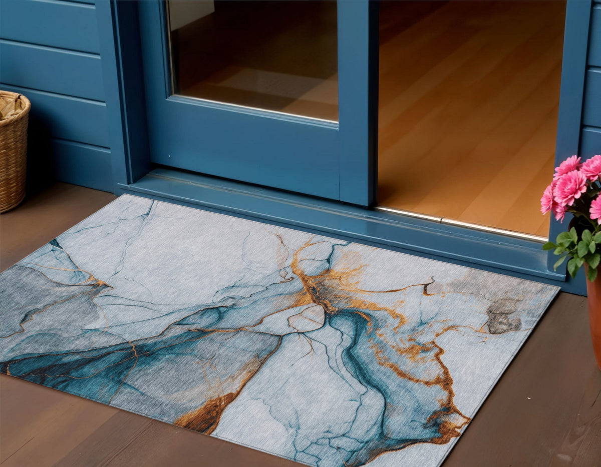 3' X 5' Sky Blue And Copper Abstract Washable Indoor Outdoor Area Rug