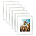 Frametory, 11x14 Picture Frame - Display 8x10 Photo with Ivory Color Mat - Wide Molding - Preinstalled Wall Mounting Hardware (S