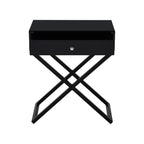Lilola Home Koda Black Wooden End Side Table Nightstand with Glass Top, Drawer and Metal Cross Base