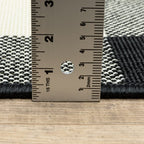 HomeRoots Polypropylene 8’ Round Black and Ivory Gingham Indoor Outdoor Area Rug