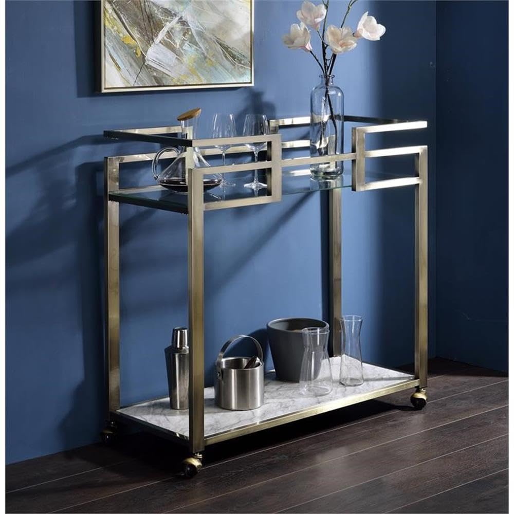 Acme Neilo Metal Frame Serving Cart with Glass Top Shelf in Clear and Wire Brass