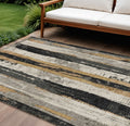 8 X 10 Taupe And Gold Striped Washable Indoor Outdoor Area Rug