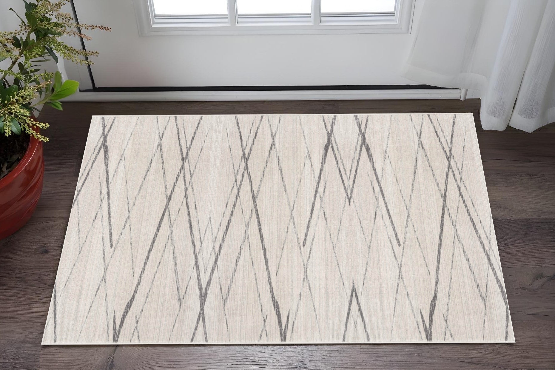 2 X 5 Beige And Gray Abstract Area Rug