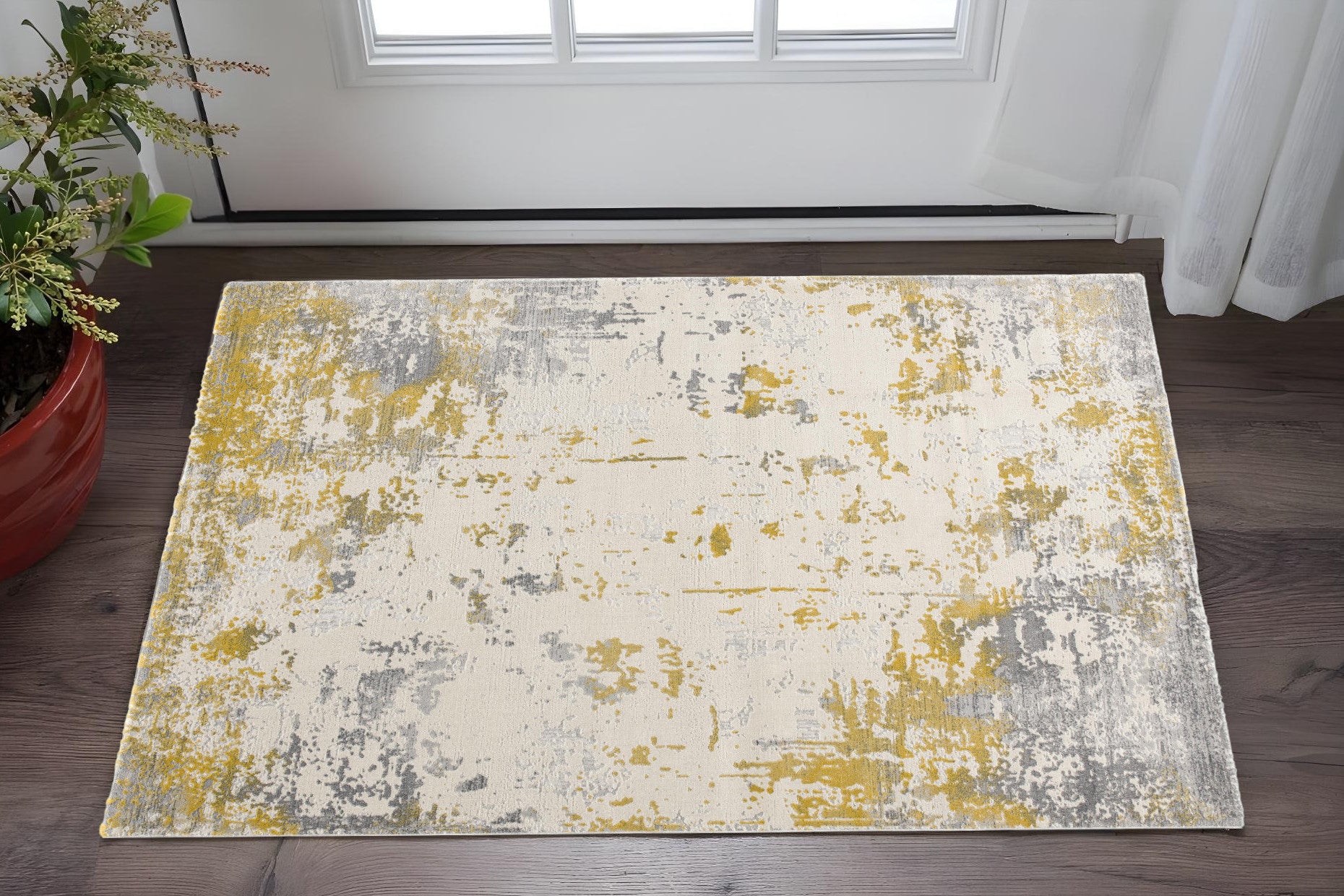 2 X 5 Gold And Gray Abstract Area Rug