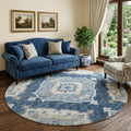 8 Blue And Ivory Tribal Distressed Washable Round Rug With UV Protection