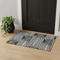 3 X 5 Black And Ivory Geometric Distressed Washable Area Rug With UV Protection