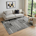 5 X 8 Black And Ivory Geometric Distressed Washable Area Rug With UV Protection