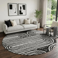 8 Black And Ivory Geometric Distressed Washable Round Rug With UV Protection