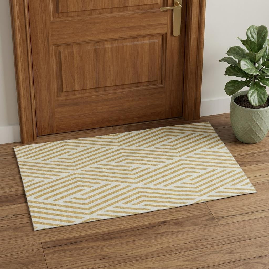 3 X 5 Gold And Ivory Geometric Washable Area Rug With UV Protection