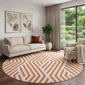 8 Rust And Ivory Geometric Washable Round Rug With UV Protection