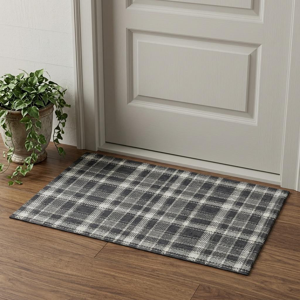 3 X 5 Black And Ivory Plaid Washable Area Rug With UV Protection
