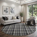 8 Black And Ivory Plaid Washable Round Rug With UV Protection