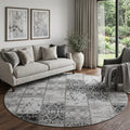 8 Gray And Ivory Patchwork Distressed Washable Round Rug With UV Protection