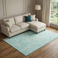 9 X 12 Teal And Ivory Paisley Washable Area Rug With UV Protection