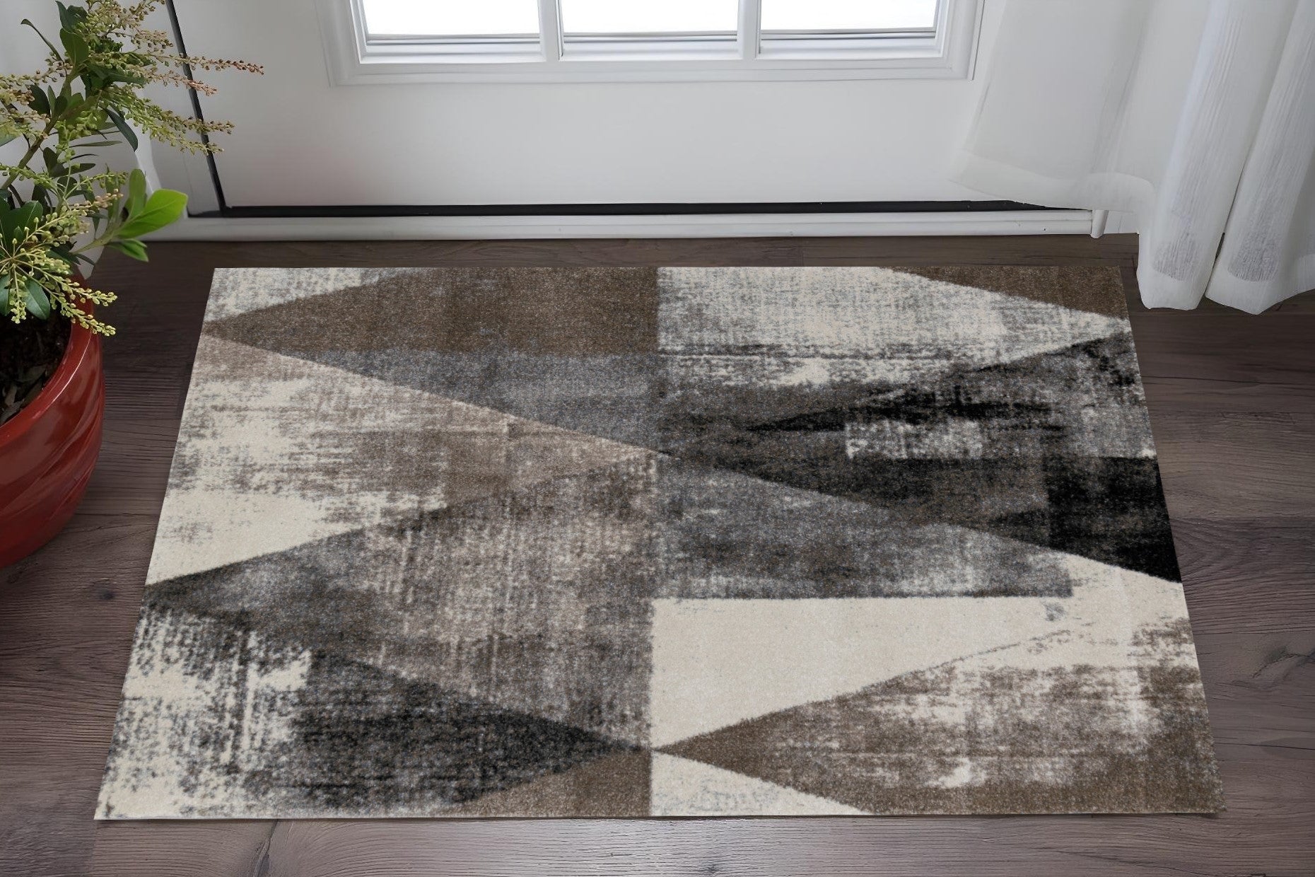 3 X 5 Cream Brown And Black Geometric Area Rug