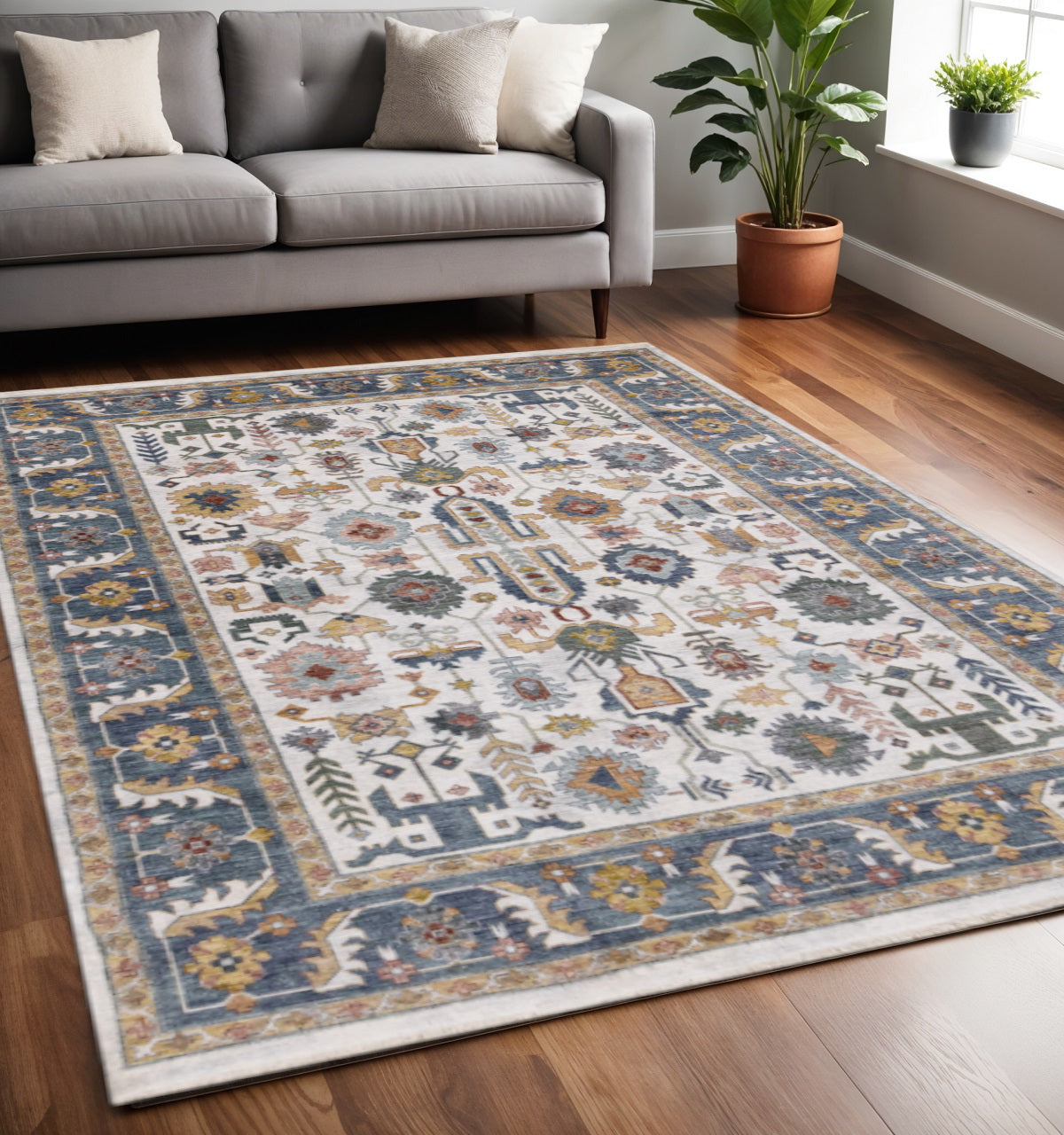 5 X 8 Cream Blue And Green Medallion Area Rug