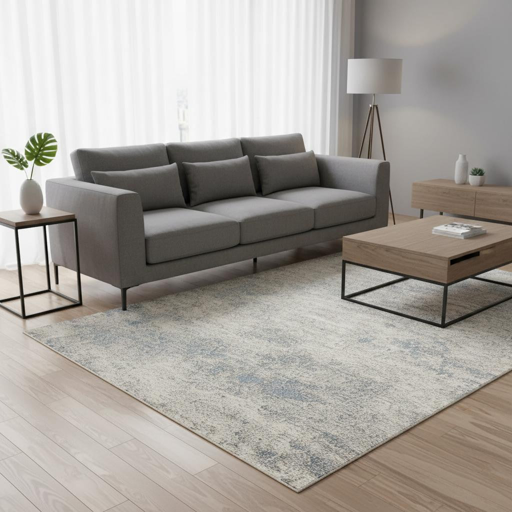 5 X 8 Cream And Blue Abstract Area Rug