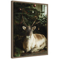 Sylvie Framed Canvas Reindeer Sitting Under a Christmas Tree by Michael Schauer