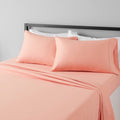 Amazon Basics Lightweight Super Soft Easy Care Microfiber 4-Piece Bed Sheet Set with 14-Inch Deep Pockets, Queen, Peachy Coral, 