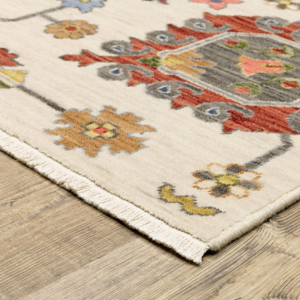 HomeRoots 509342 6 x 9 ft. Ivory Yellow Rust Green Gray Pink Orange Blue & Gray Oriental Power Loom Stain Resistant Rectangle Area Rug with Fringe