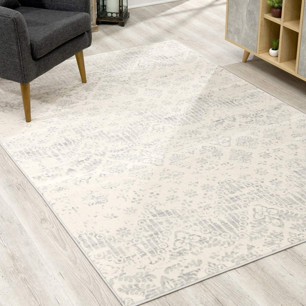 HomeRoots 100% Polypropylene 2’ x 6’ Ivory Distressed Ikat Pattern Area Rug
