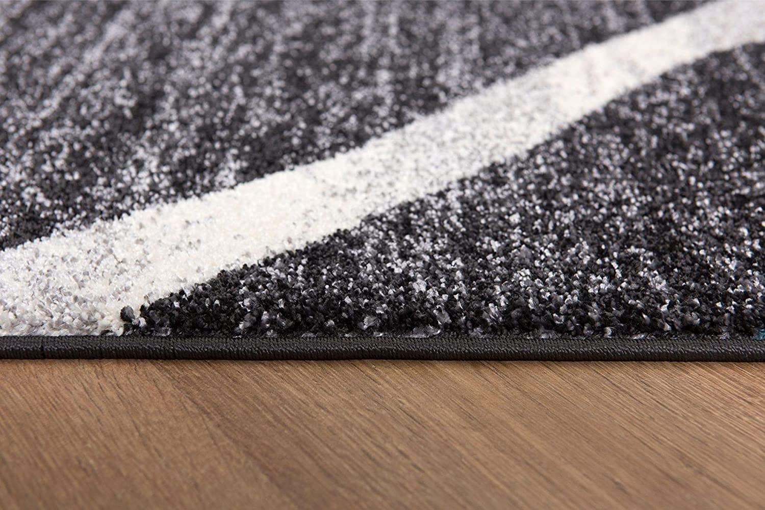 HomeRoots Grey 100% Twisted Polyester 7â€ x 9â€ Distressed Black and Gray Abstract Area Rug