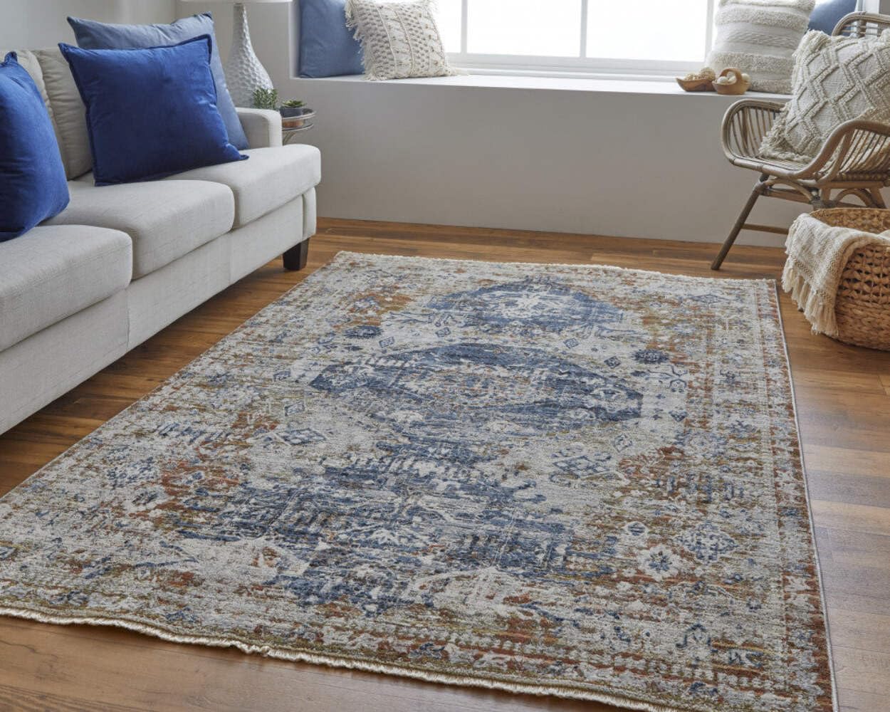 10' Ivory Orange And Blue Floral Power Loom Distressed Runner Rug With Fringe