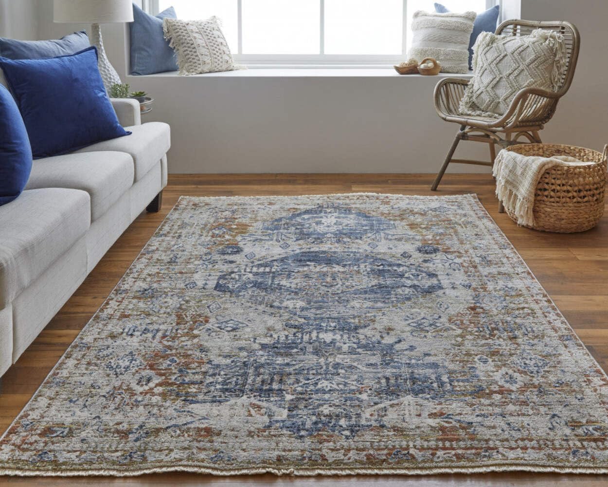 10' Ivory Orange And Blue Floral Power Loom Distressed Runner Rug With Fringe