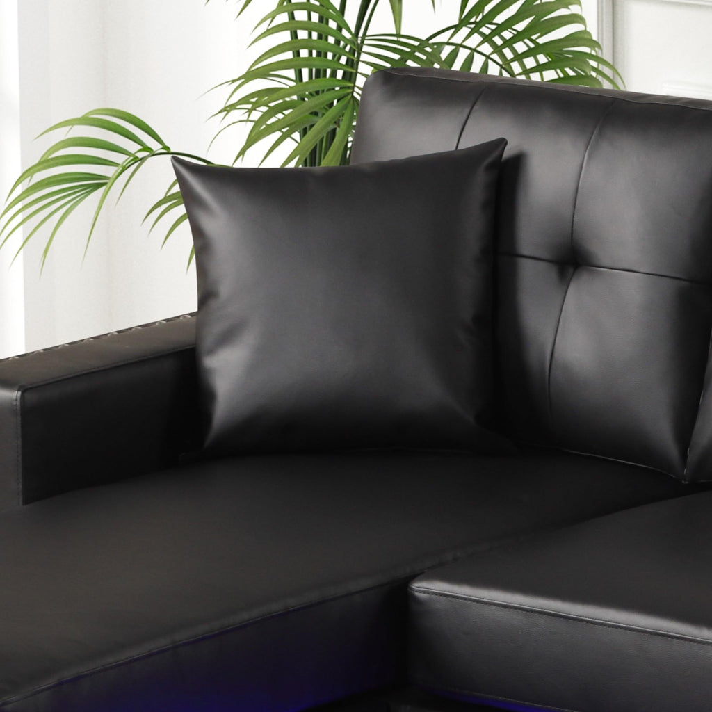 Sorenza 74' W Black PVC Reversible Sectional Sofa Chaise with LED Light, USB Port, Nailhead Trim, Throw Pillows, Tufted Cushion