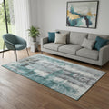 5 X 8 Teal Charcoal And Ivory Abstract Washable Area Rug With UV Protection