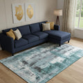 9 X 12 Teal Charcoal And Ivory Abstract Washable Area Rug With UV Protection