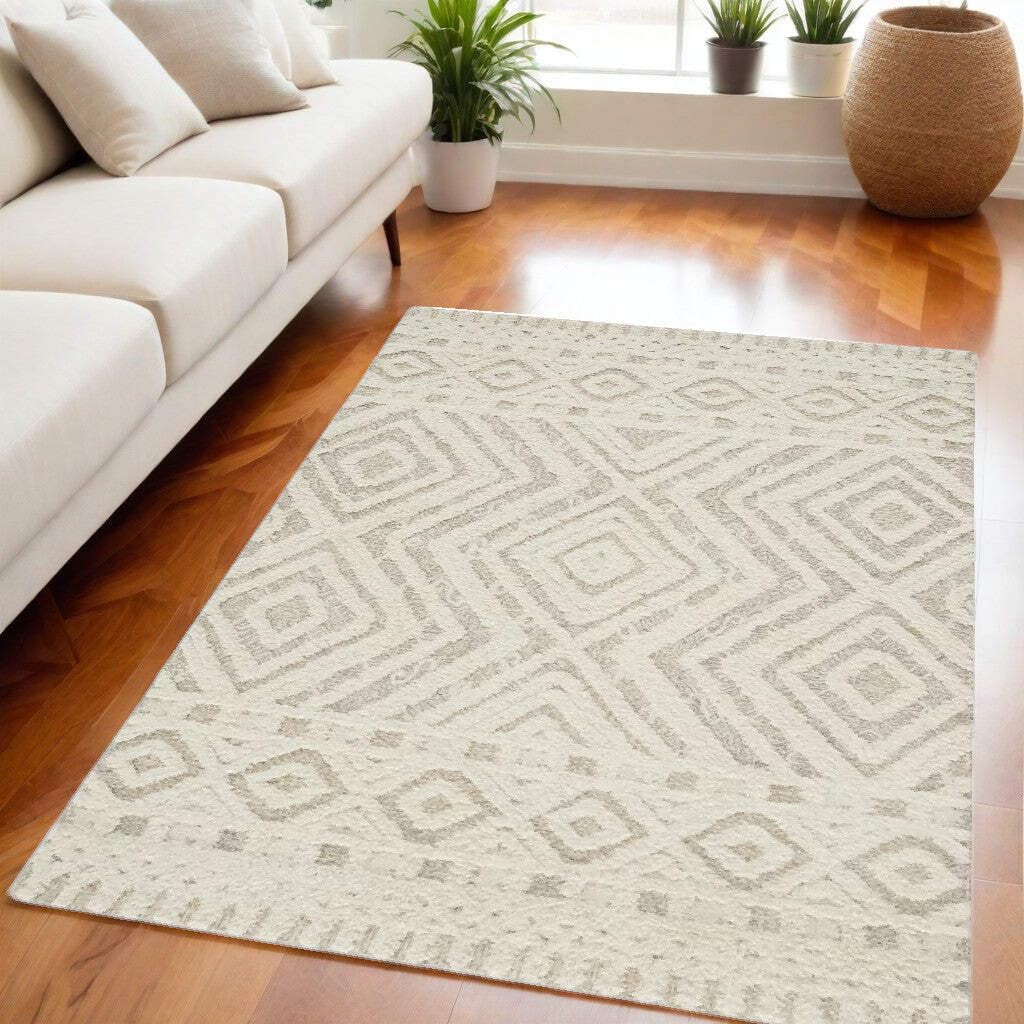 HomeRoots 512798 9 x 12 ft. Ivory & Tan Wool Geometric Hand Tufted Handmade Stain Resistant Rectangle Area Rug