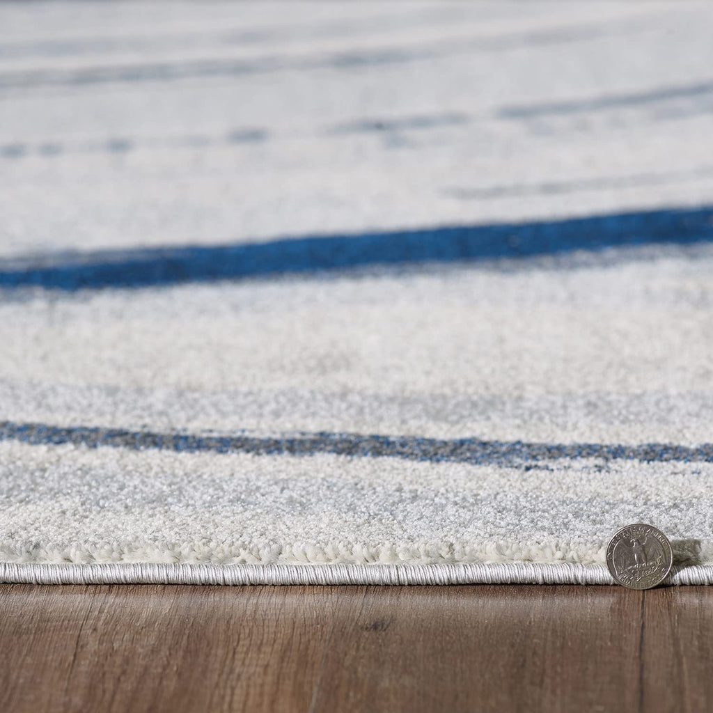 HomeRoots Ivory/Blue Heat-Set Polypropelene 8’ x 11’ Navy Ivory Abstract Strokes Modern Area Rug