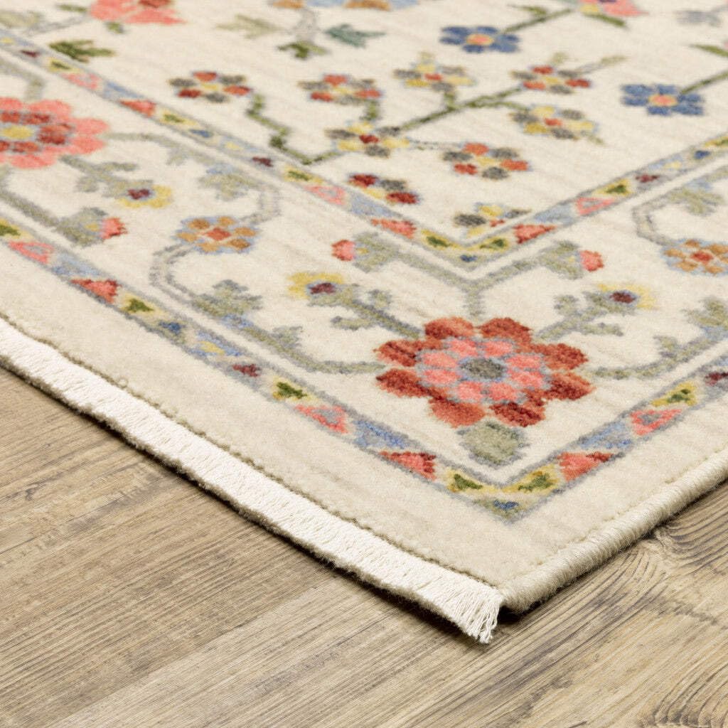 HomeRoots 509288 10 x 13 ft. Ivory Salmon Pink Gold Blues Gray Rust & Green Oriental Power Loom Stain Resistant Rectangle Area Rug with Fringe