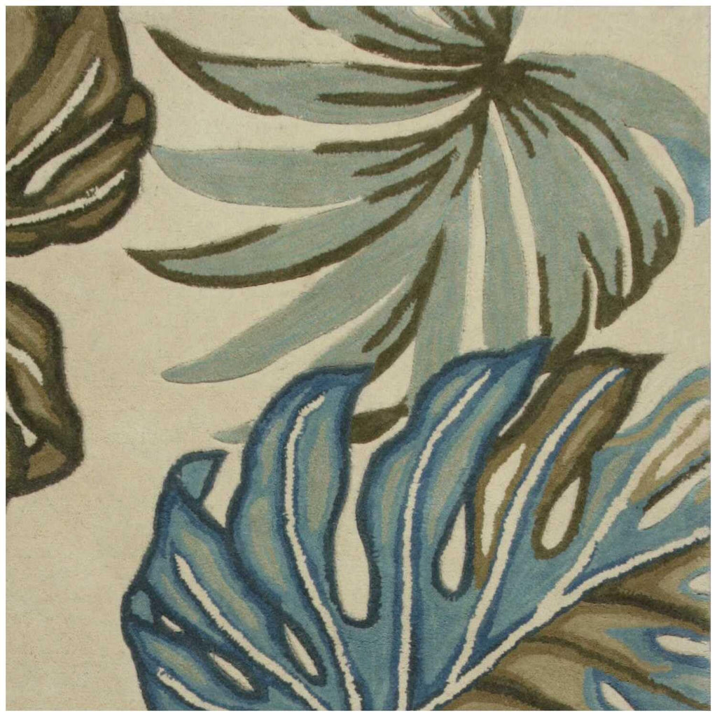 HomeRoots 9'X12' Ivory Hand Tufted Monstera Indoor Area Rug