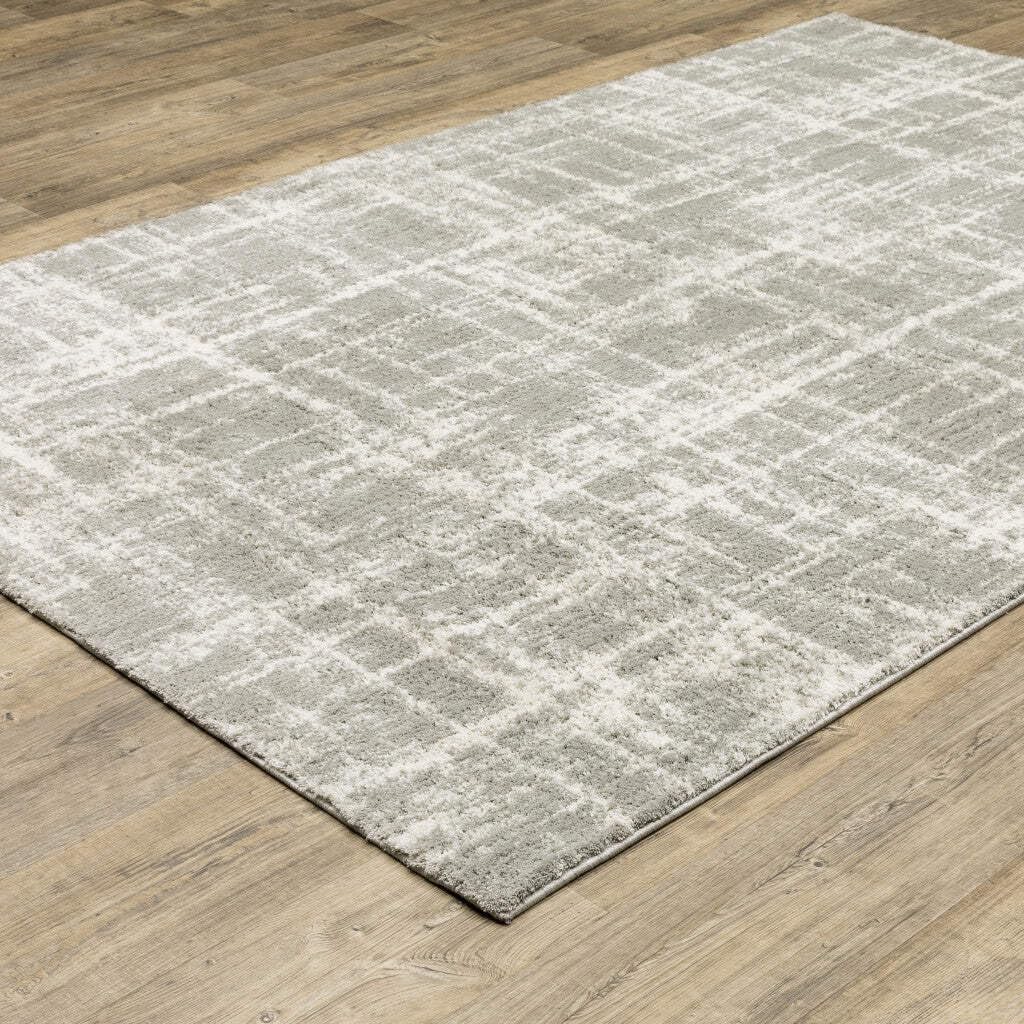 HomeRoots 510860 10 x 13 ft. Gray & Ivory Abstract Shag Power Loom Stain Resistant Rectangle Area Rug