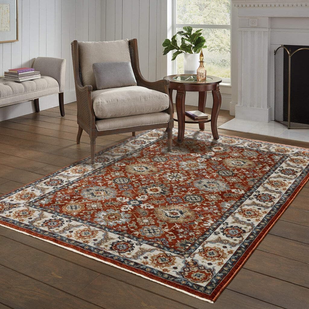 HomeRoots 508022 8 x 11 ft. Red Blue Ivory Gold & Navy Oriental Power Loom Stain Resistant Rectangle Area Rug with Fringe