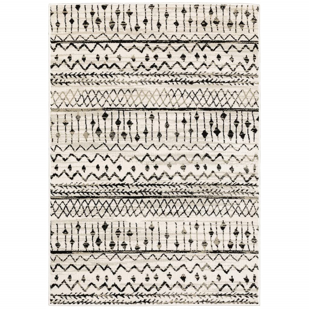 HomeRoots Polypropylene 4’ x 6’ Ivory and Black Eclectic Patterns Indoor Area Rug