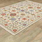 HomeRoots 509288 10 x 13 ft. Ivory Salmon Pink Gold Blues Gray Rust & Green Oriental Power Loom Stain Resistant Rectangle Area Rug with Fringe