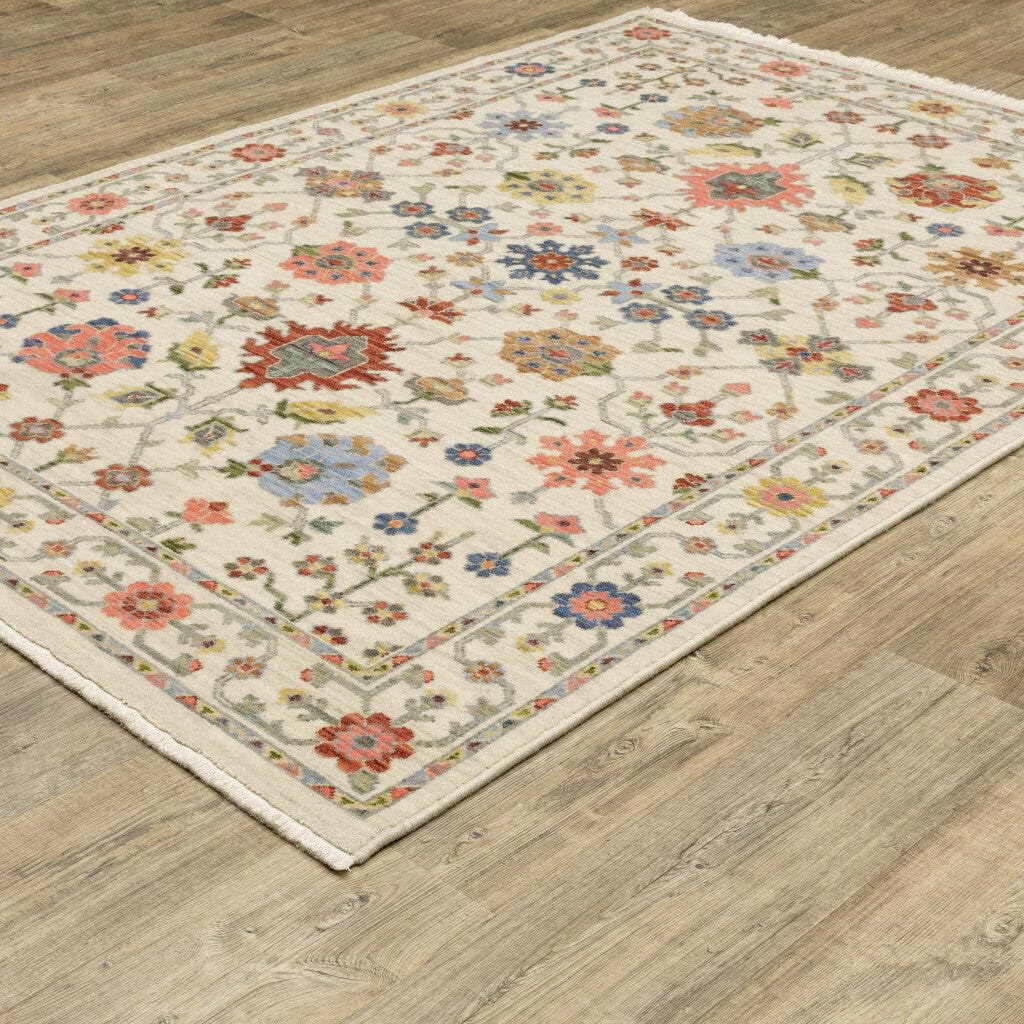 HomeRoots 509288 10 x 13 ft. Ivory Salmon Pink Gold Blues Gray Rust & Green Oriental Power Loom Stain Resistant Rectangle Area Rug with Fringe