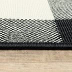 HomeRoots Polypropylene 2’x8’ Black and Ivory Gingham Indoor Outdoor Runner Rug