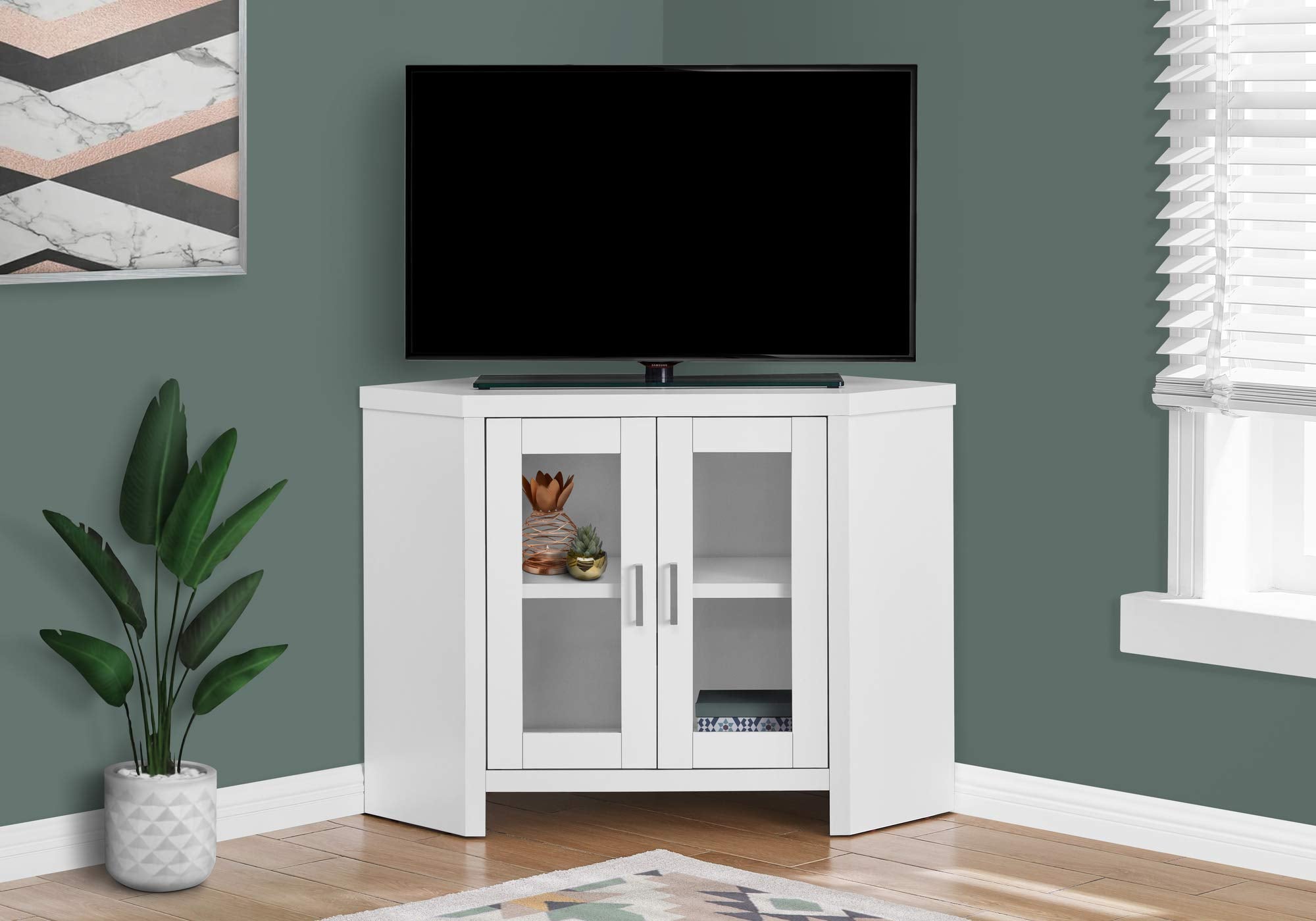 HomeRoots Particle Board, Glass, Hollow-Core, Laminate, MDF, White Corner TV Stand with Glass Doors