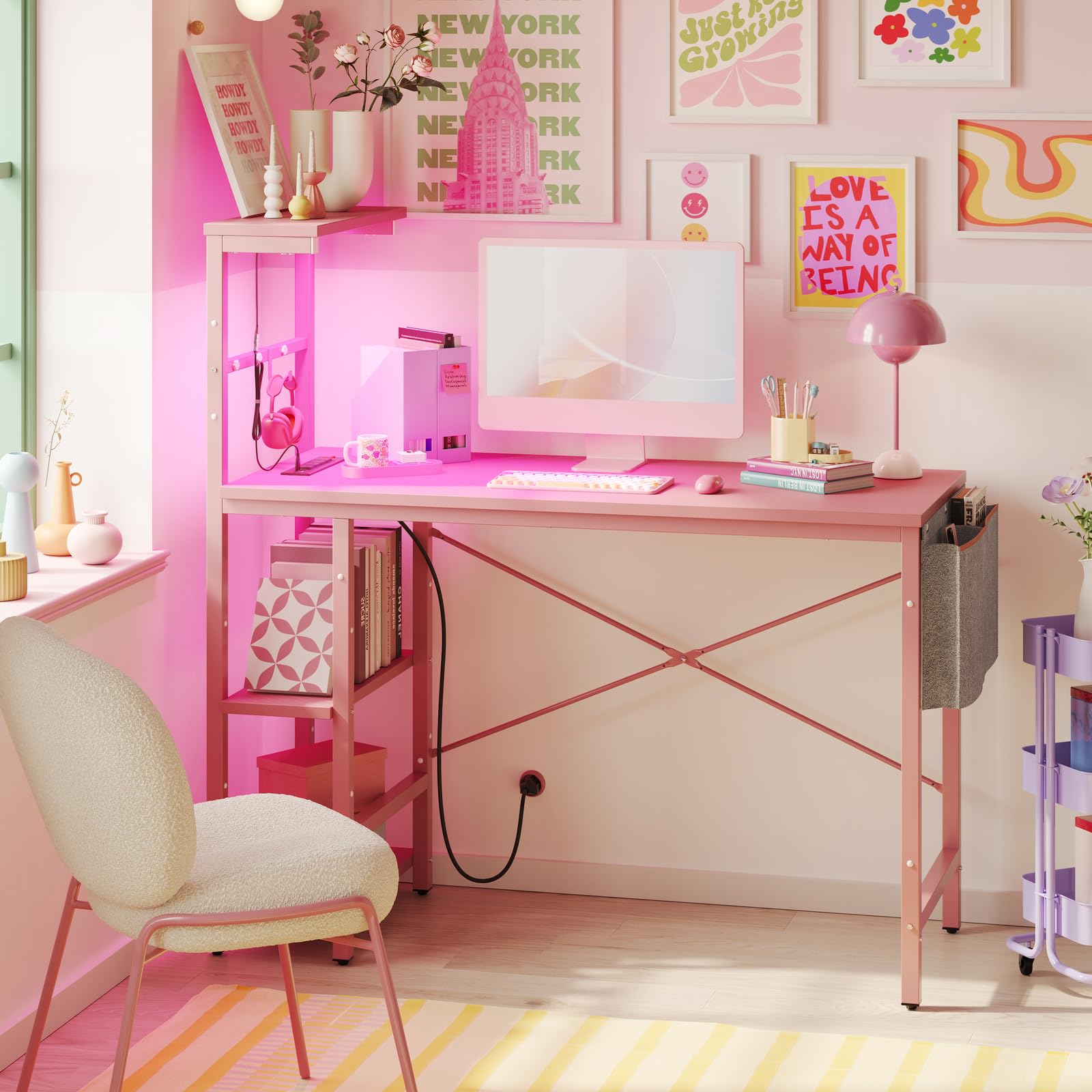 Bestier Gaming Desk 44 Inch with Power Outlets, LED Lights, Reversible Shelves, Headset Hook, Pink 3D Carbon Fiber Engineered Wood