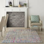 HomeRoots Ivory/Multi 100% Polypropylene 5’ x 7’ Ivory Abstract Striations Area Rug
