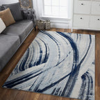 HomeRoots Ivory/Blue Heat-Set Polypropelene 5’ x 8’ Navy Ivory Abstract Strokes Modern Area Rug