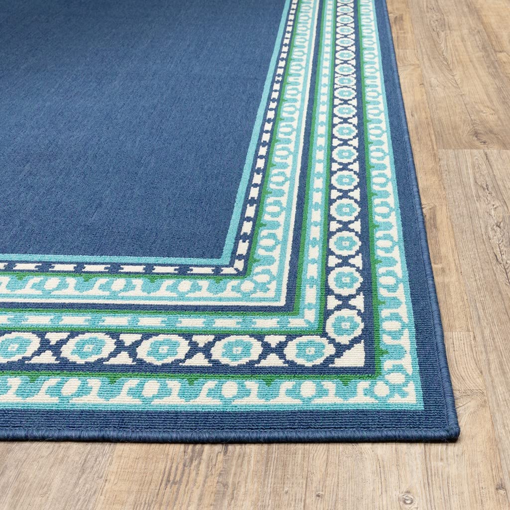 HomeRoots Polypropylene 4’x6’ Navy and Green Geometric Indoor Outdoor Area Rug