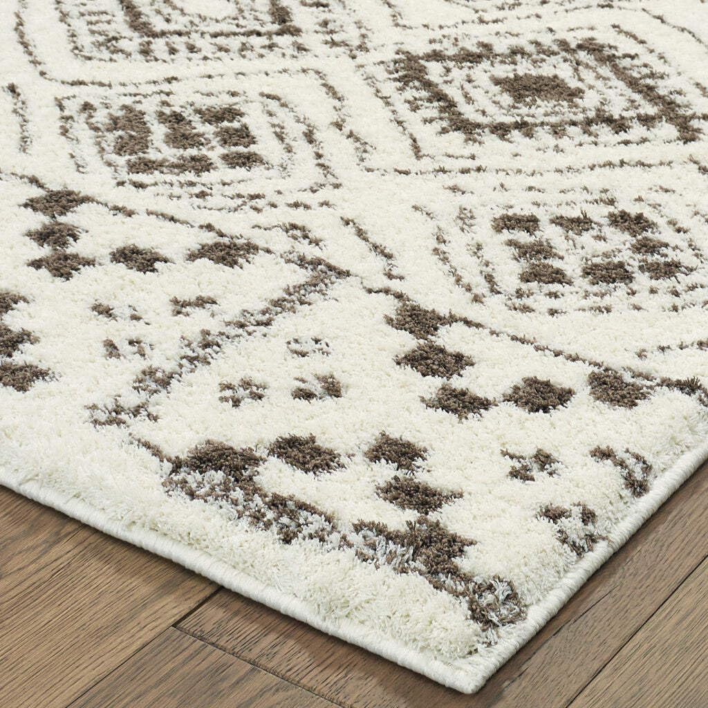 HomeRoots 509910 8 x 11 ft. Ivory & Brown Geometric Shag Power Loom Stain Resistant Rectangle Area Rug