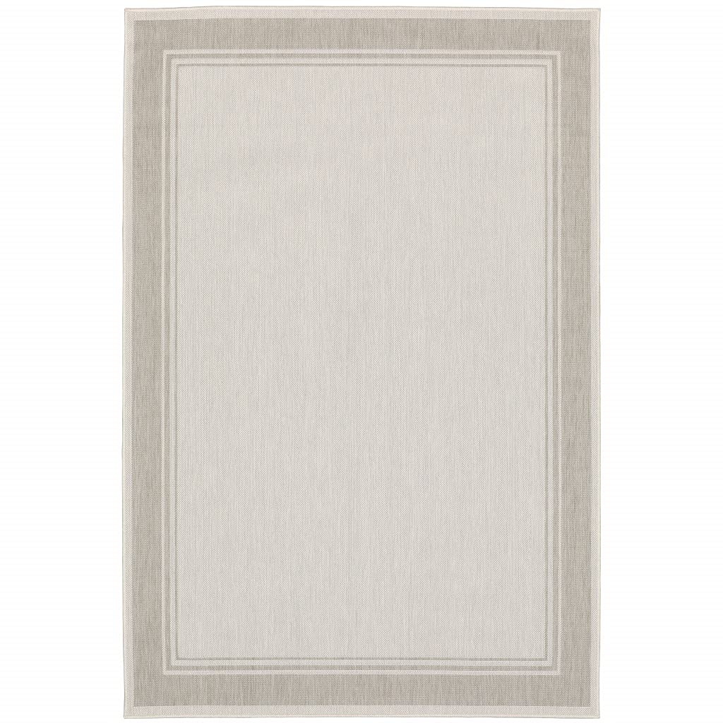 HomeRoots Polypropylene 5’x7’ Ivory and Gray Bordered Indoor Outdoor Area Rug